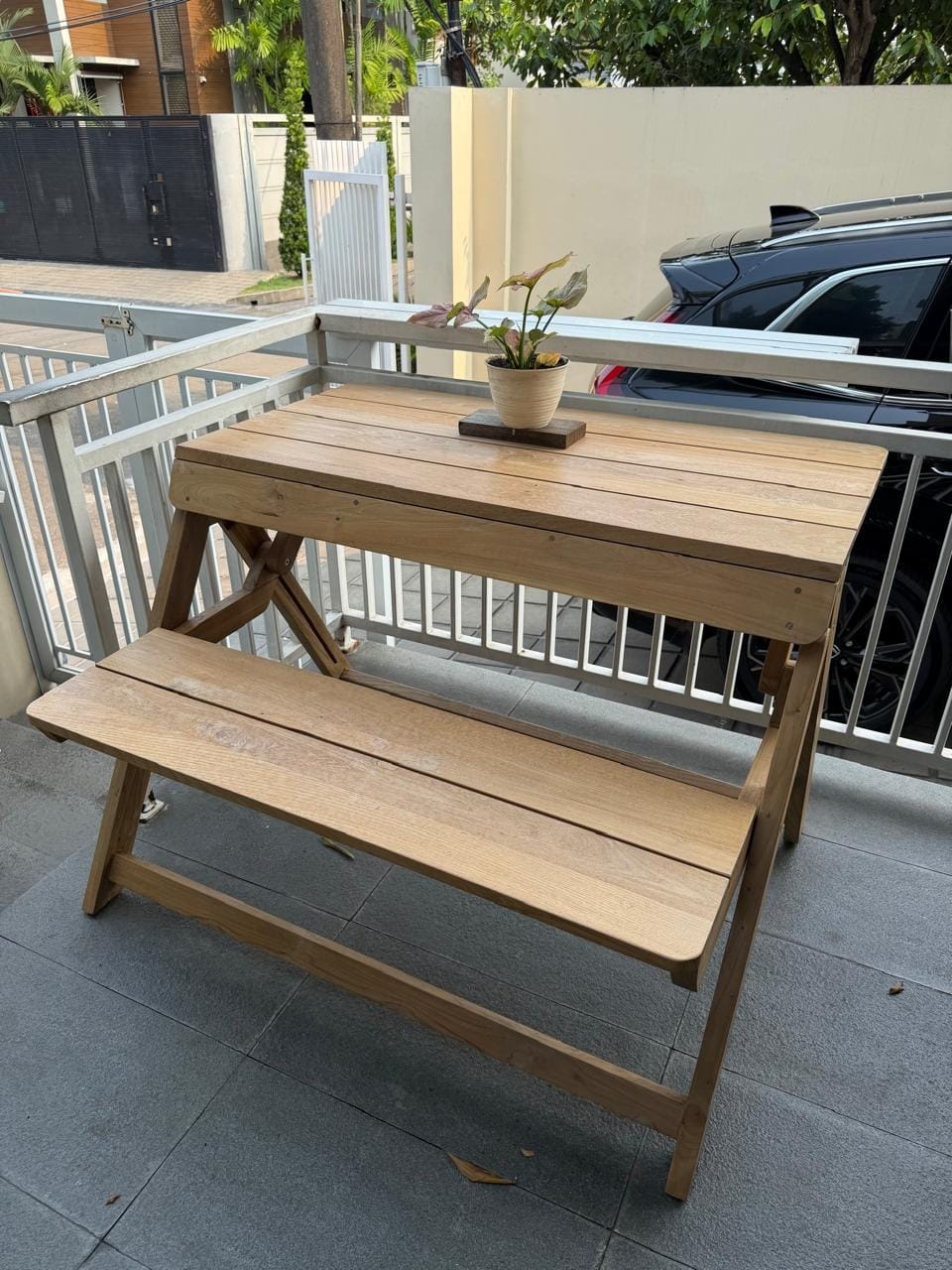 Customer photo review of Foldable Outdoor Table with Built-In Bench — Quality Reclaimed Teak Wood