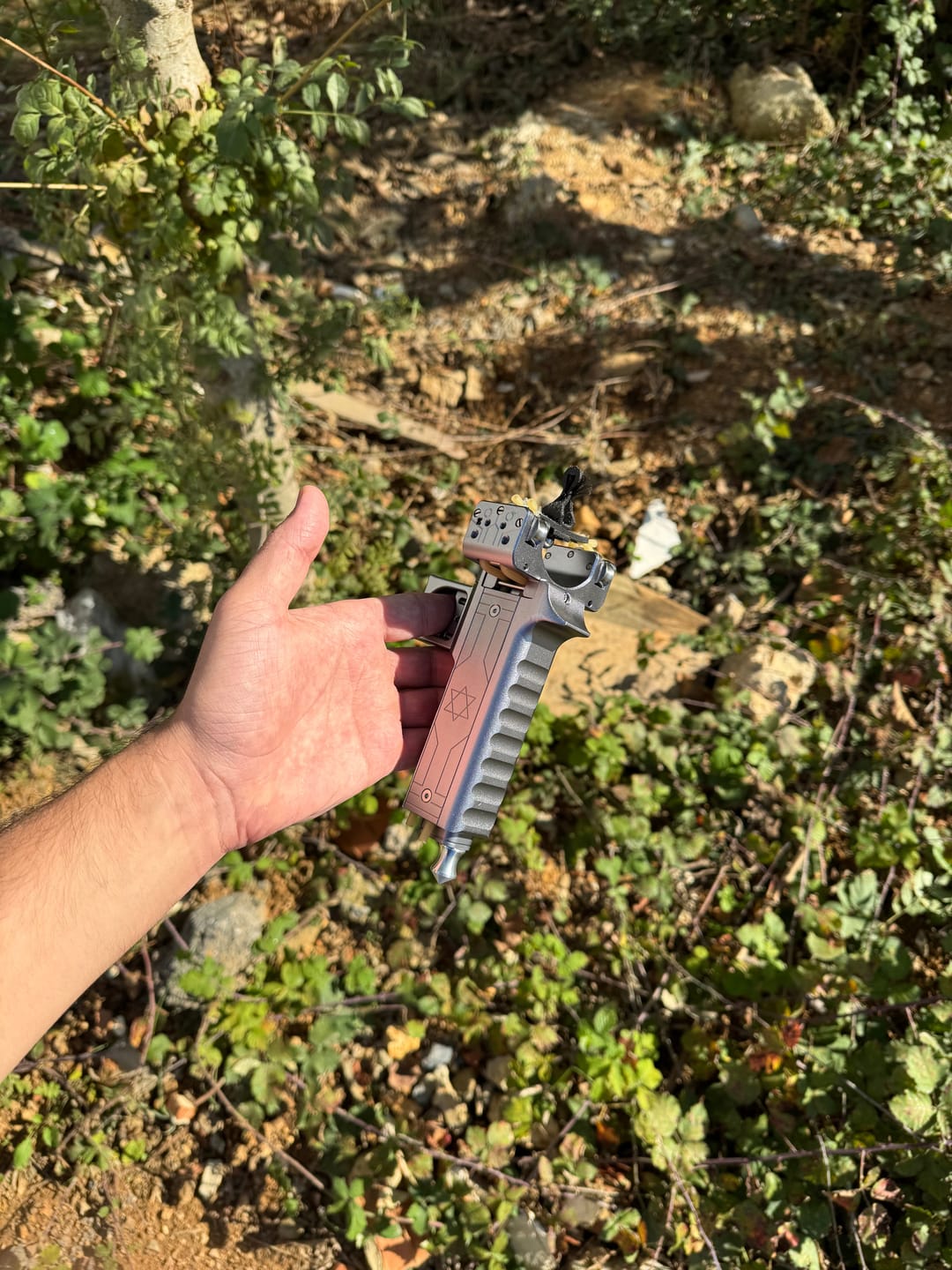 Customer photo review of V5 Semi Auto Slingshot with Dual Magazine 22 Round Capacity
