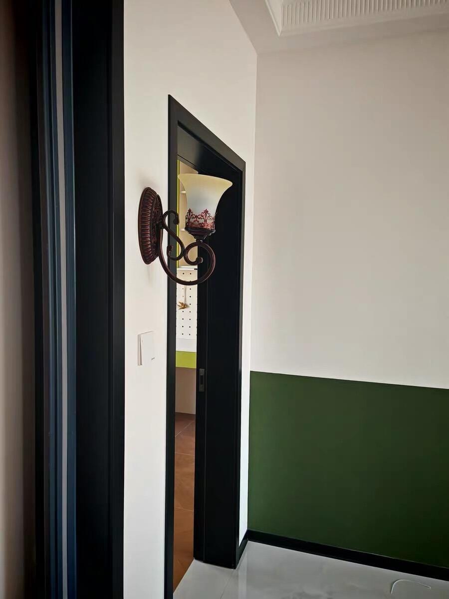 Customer photo review of Black Iron Wall Light, Two Arms, Glass Shades, Wall Sconce