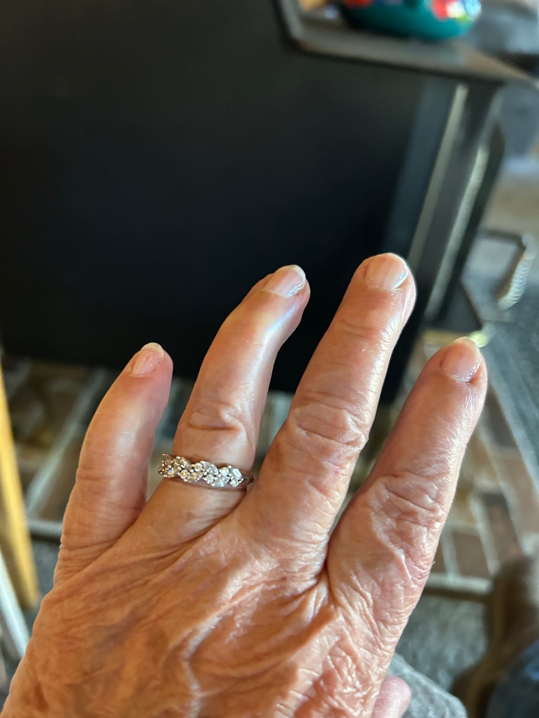 Customer photo review of Botanical Cluster Marquise And Round Moissanite Half Eternity Wedding Band