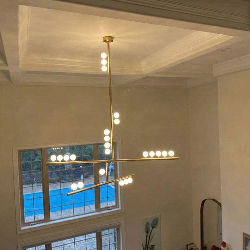 Customer photo review of White Orb Glass Pendant Light, Hand-Blown, Tilting Joints, Brass