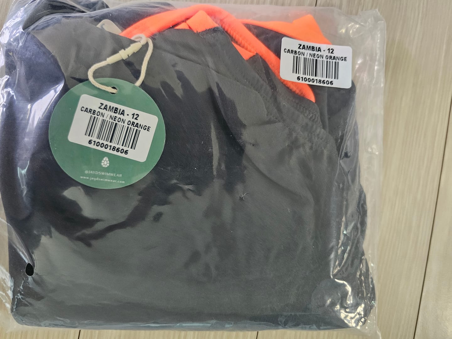 Customer photo review of ZAMBIA ONE PIECE - Carbon|Neon Orange (Pre-Order)