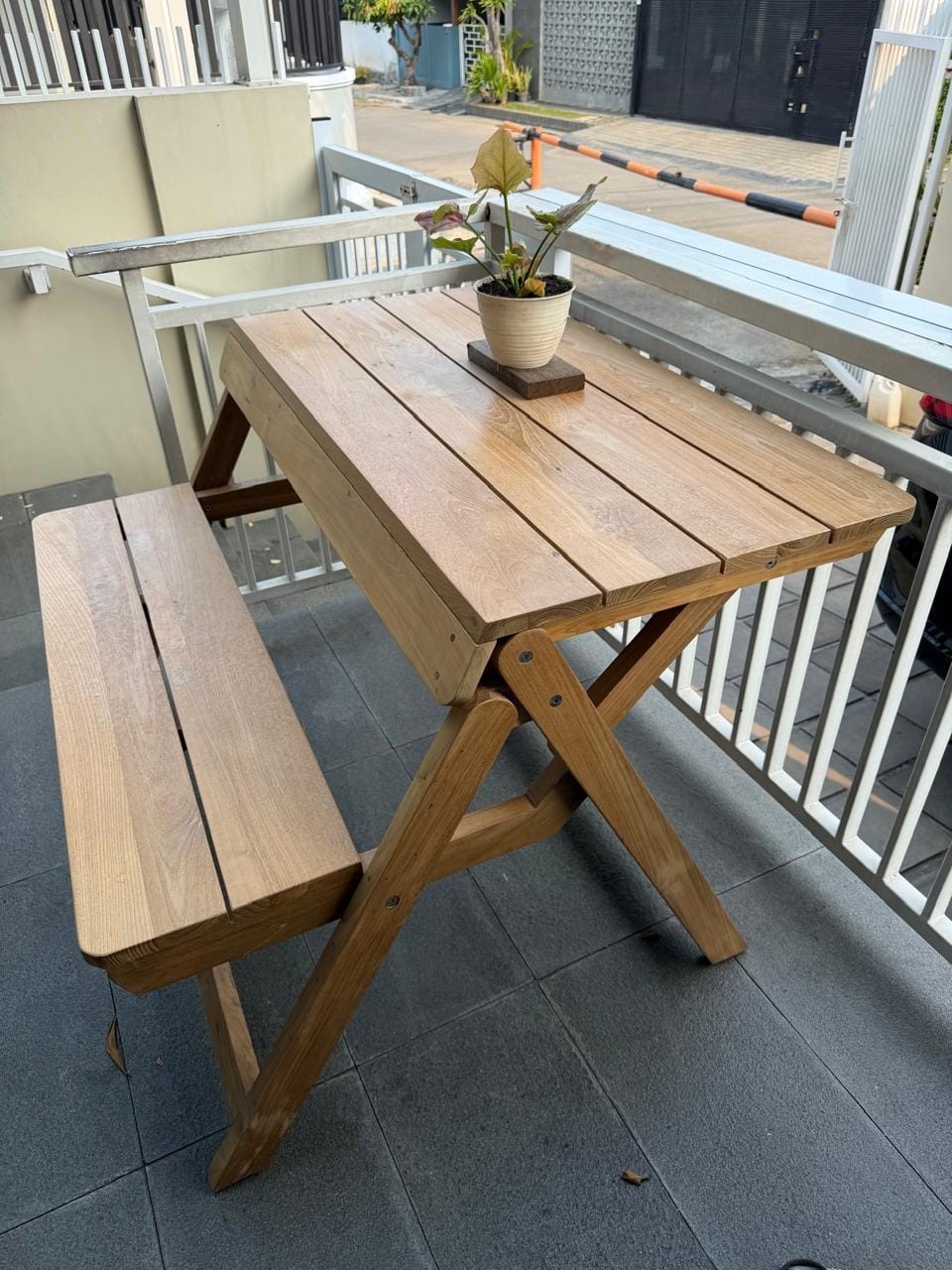 Customer photo review of Foldable Outdoor Table with Built-In Bench — Quality Reclaimed Teak Wood