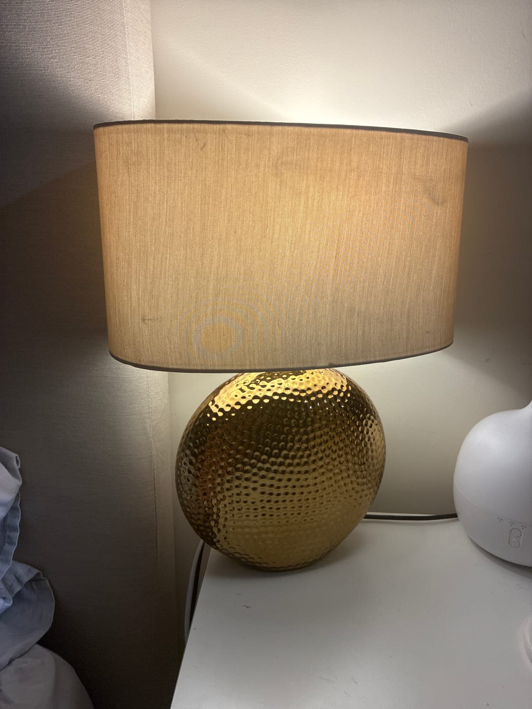 Customer photo review of Hammered Bronze Ceramic Table Lamp with Taupe Oval Shade