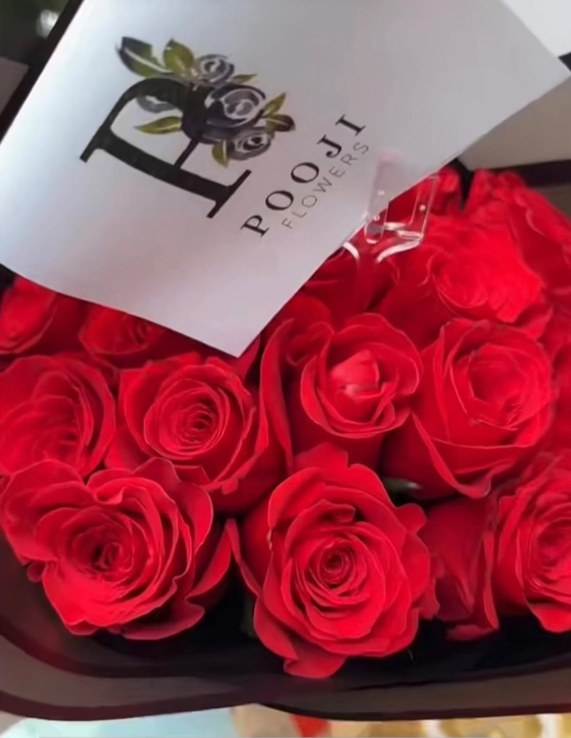 Customer photo review of Red Roses Bouquet – 15 Stems Black Wrap