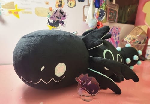 Customer photo review of Rain World - Glowing Cyan Lizard Plush
