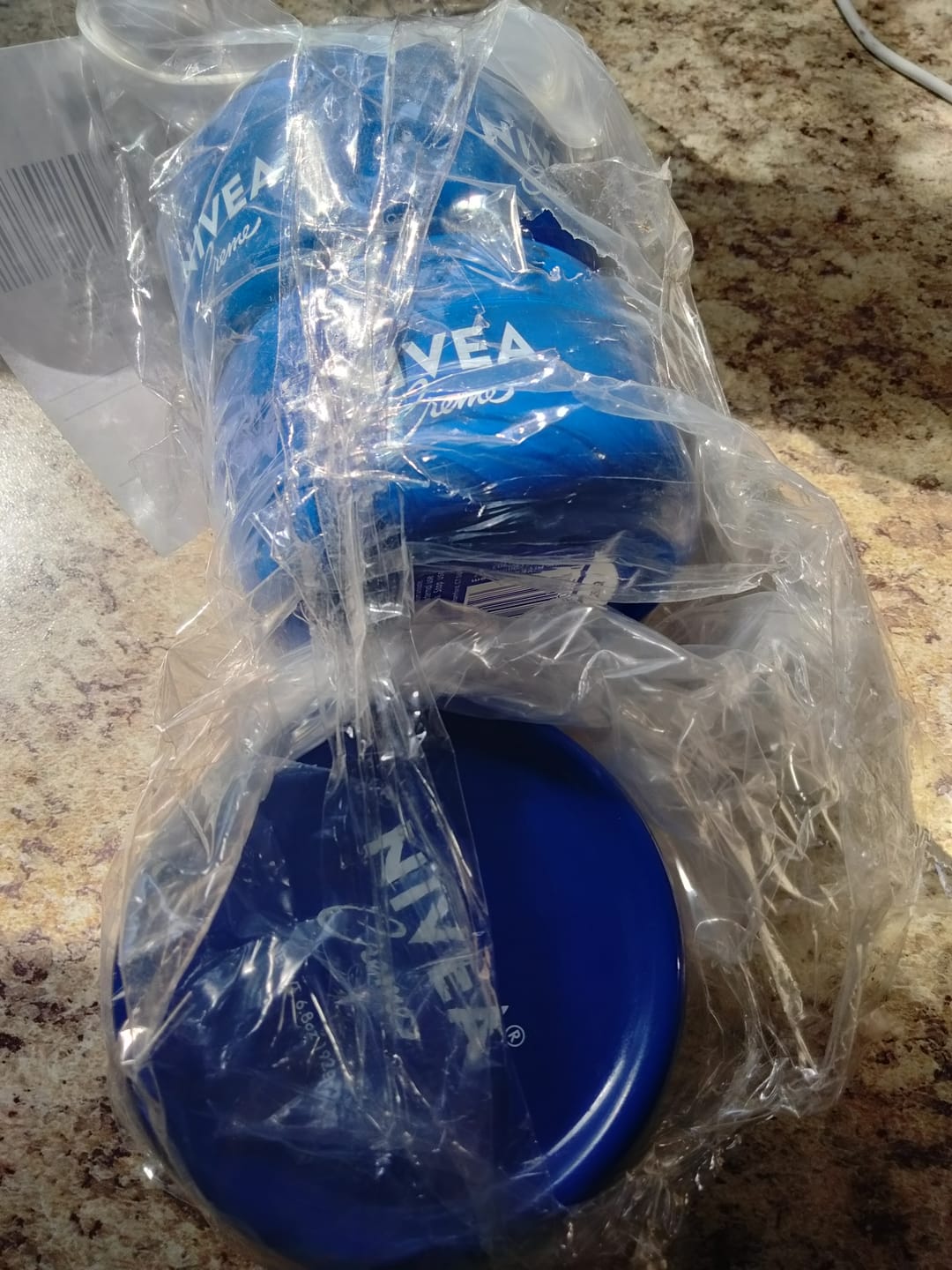 Customer photo review of NIVEA Creme Body, Face and Hand Moisturizing Cream, 6.8 Oz (80 Pcs Lot)