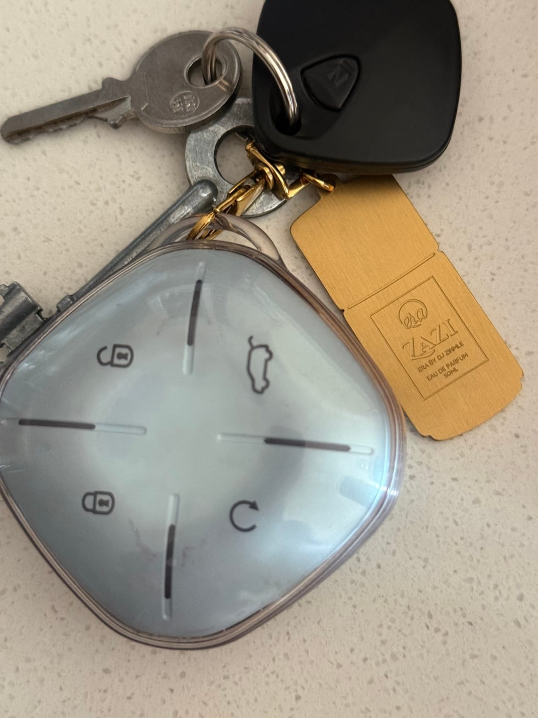 Customer photo review of ZAZI Eau de Parfum Key Holder – Gold Tone