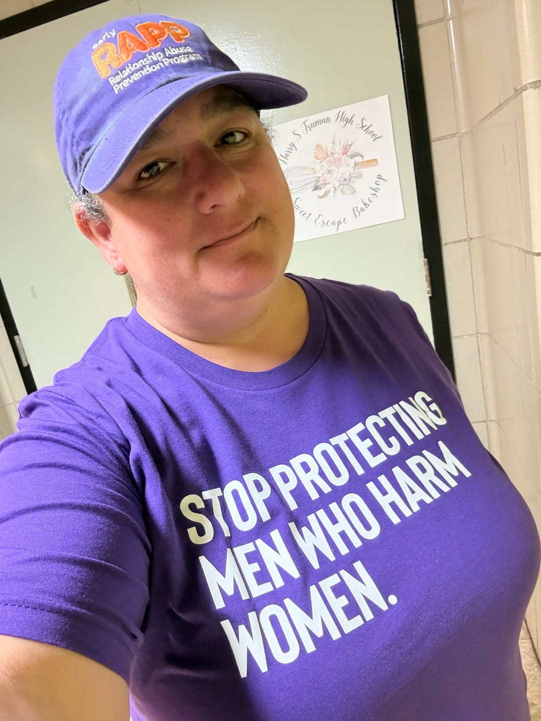 Customer photo review of Stop Protecting Men Who Harm Women Unisex Tee