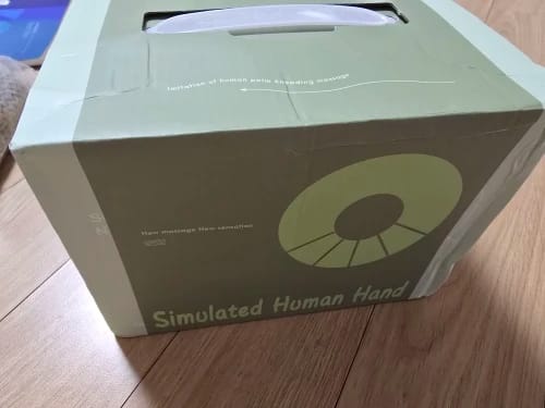 Customer photo review of SmartHand · Masajeador de cuello y hombros