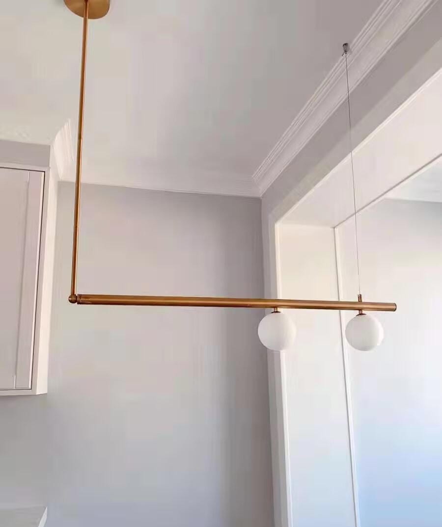 Customer photo review of Pivoting Opal Glass Pendant Light for Dining Table, Brass