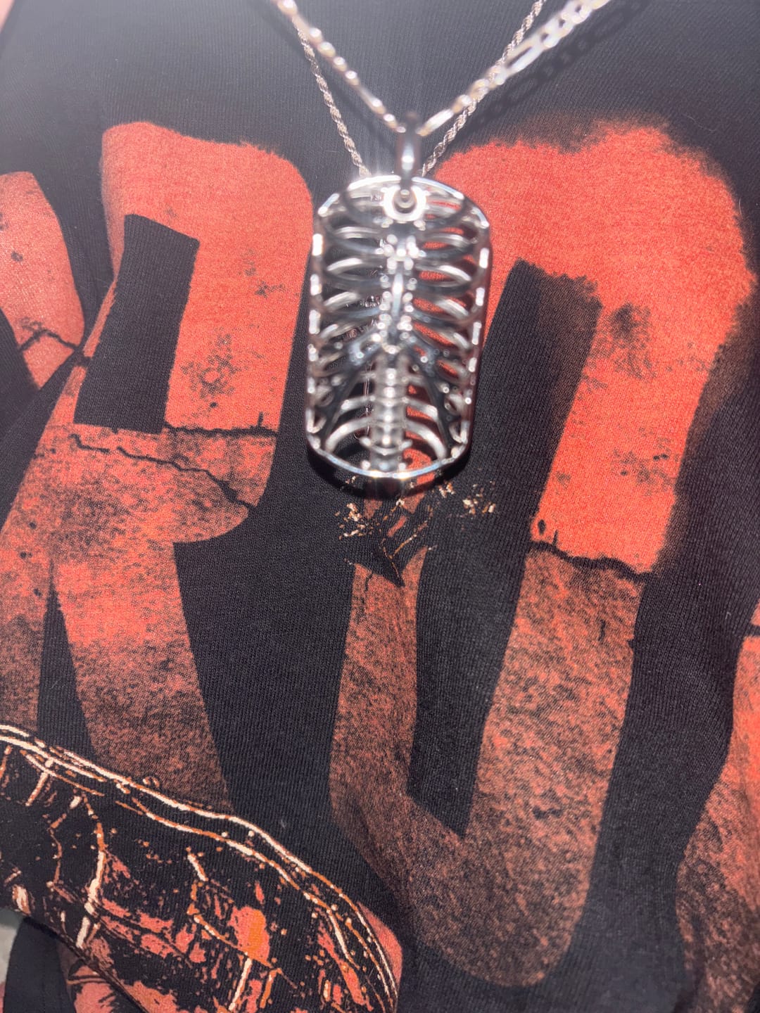 Customer photo review of RIBCAGE DOG TAG NECKLACE