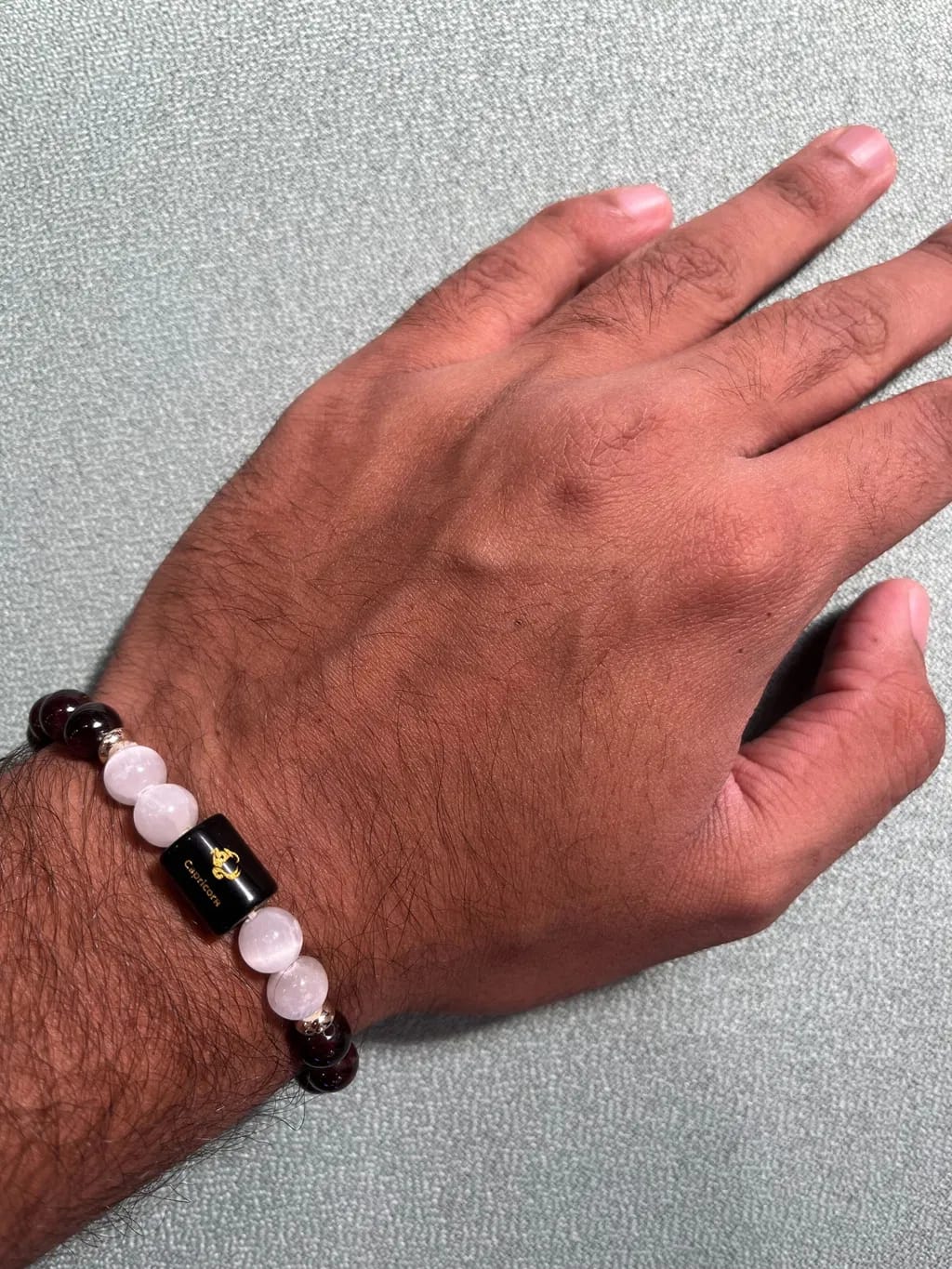 Customer photo review of Capricorn (Makar Rashi) Zodiac Bracelet – Natural Garnet & Milky Quartz