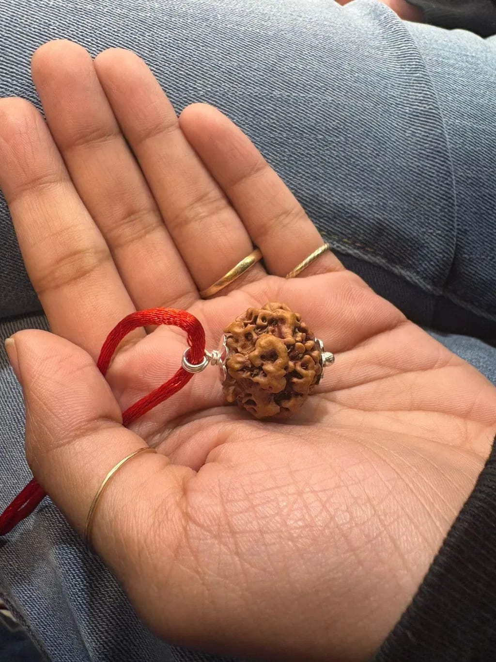 Customer photo review of Nepal Origin 1 Mukhi Rudraksha – 100% Natural & Certified