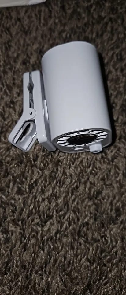 Customer photo review of Clip-On Golf Cart Fan, Rechargeable Mini Fan with 100 Speeds