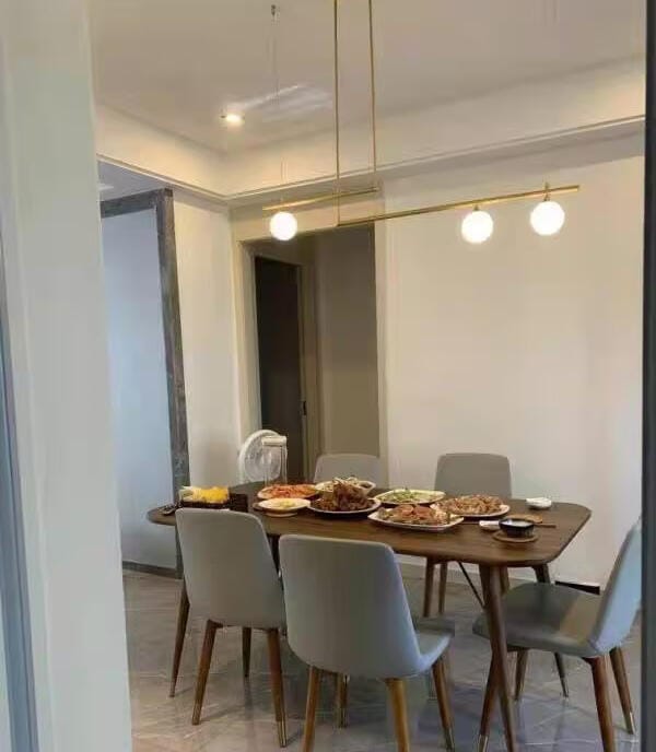 Customer photo review of Pivoting Opal Glass Pendant Light for Dining Table, Brass