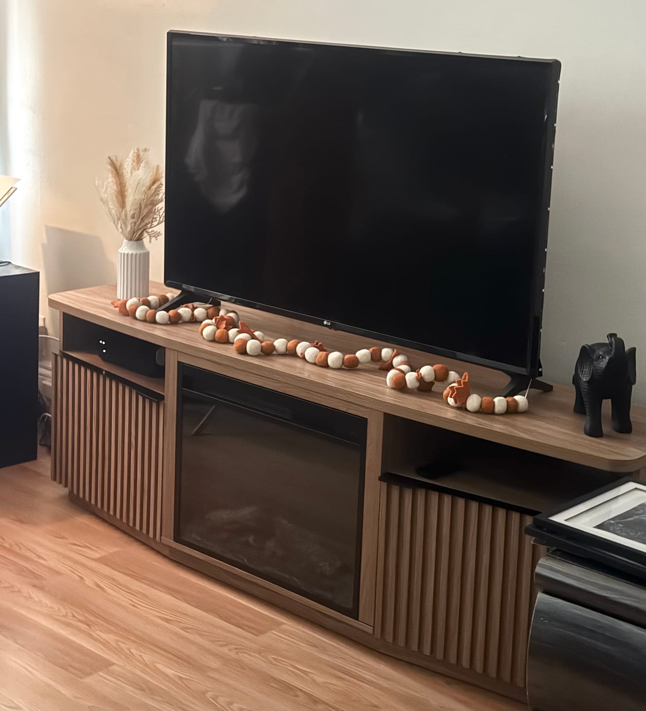 Customer photo review of Sofia 68" Slatted Door Fireplace TV Stand