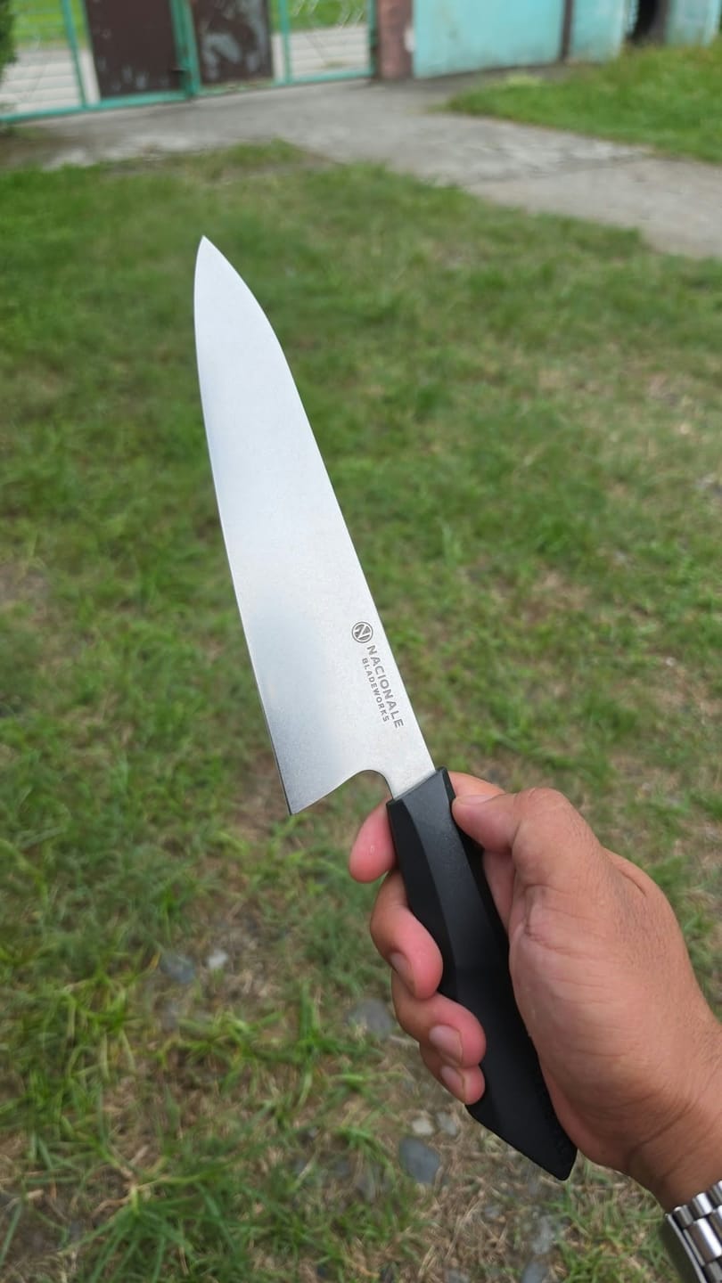 Customer photo review of 215mm Chefs Knife. AUS8 Steel. Recycled Plastic Skateboard Material Handle