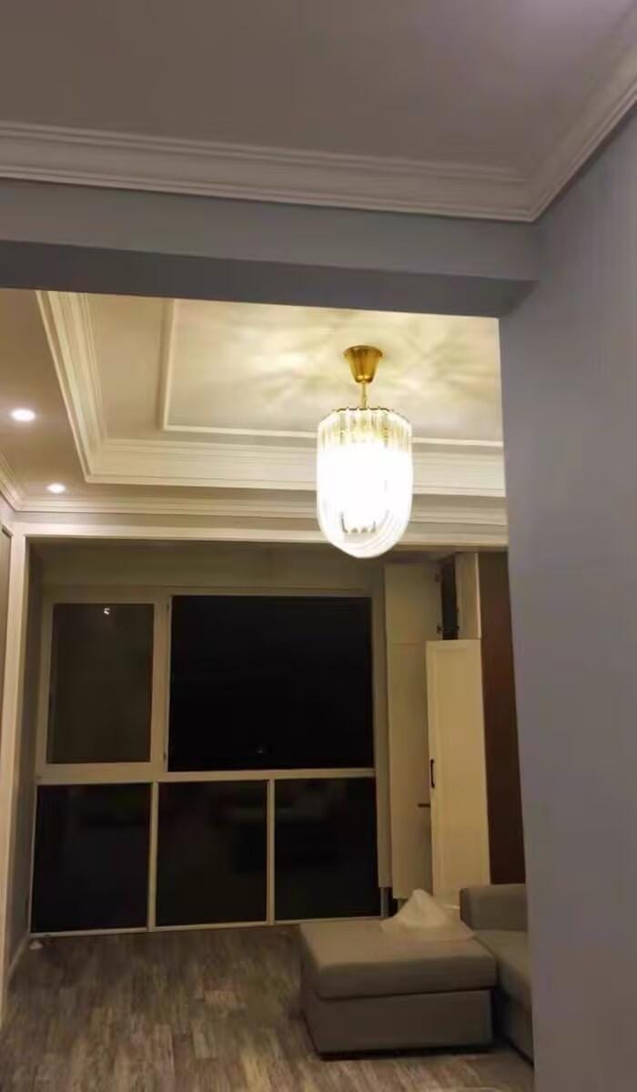 Customer photo review of Glass Pendant Light, Gold Frame, Hand-Shaped Clear Glass Rods