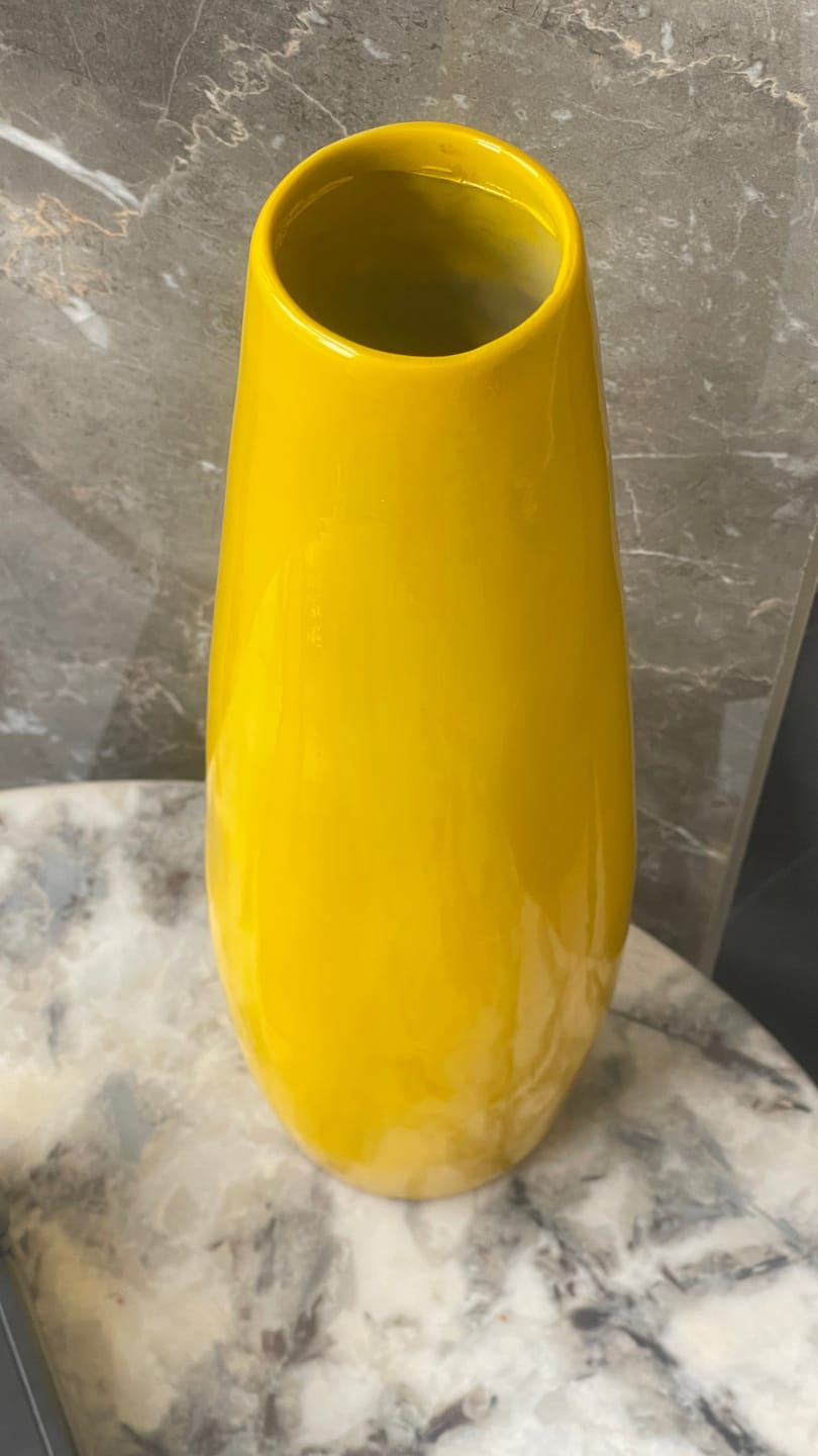 Customer photo review of Yellow Resin Vase Sculpture Vastu Remedy for Financial Stability, and Expenditure Control for SSW Direction Placement in Home, Office and Living Spaces | 8 x 37 cm | 600 gm