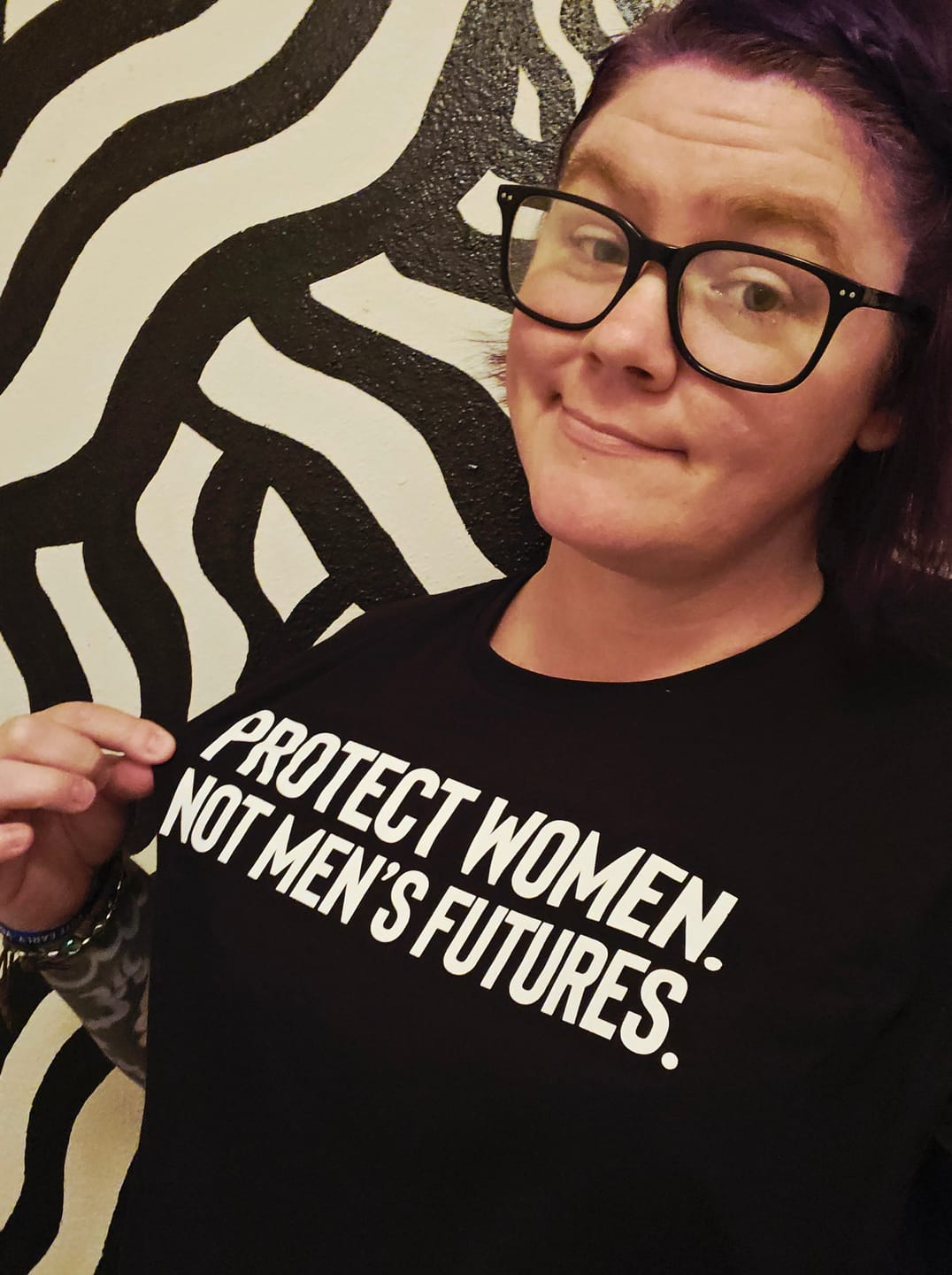 Customer photo review of Protect Women. Not Men’s Futures Unisex Tee