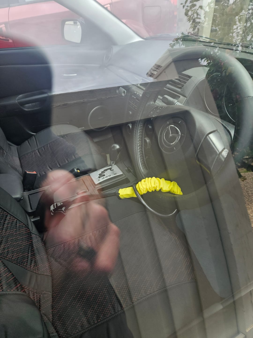 Customer photo review of Lock'd Car Defender — Visible Protection That Thieves Can't Ignore