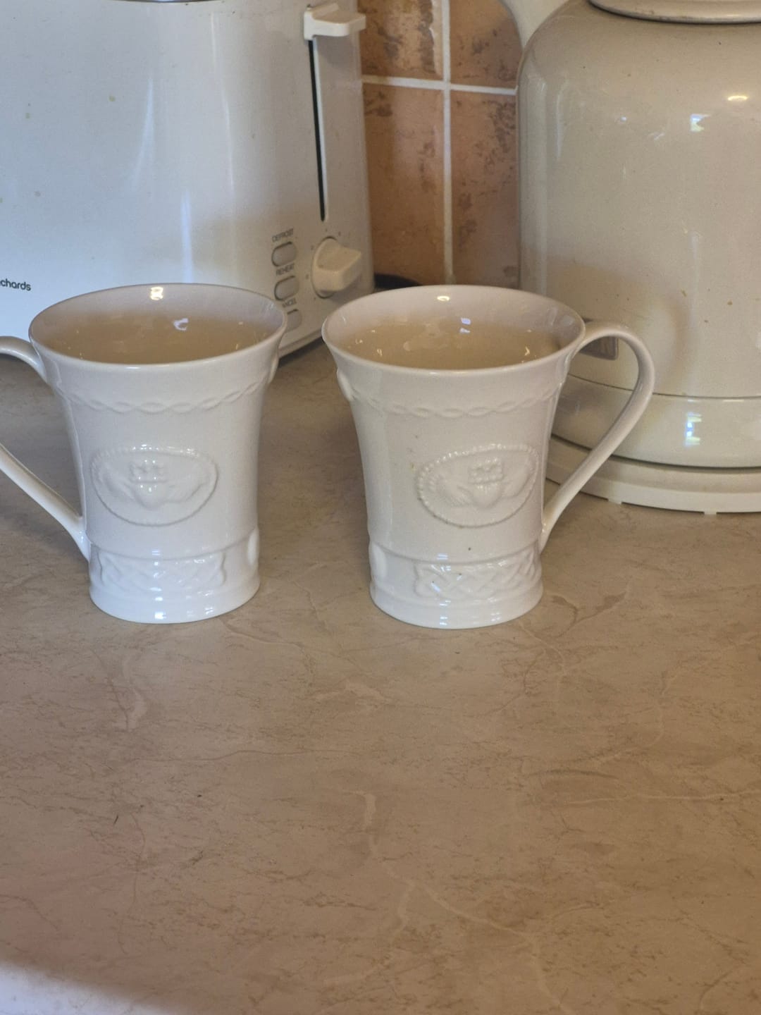 Customer photo review of Belleek Classic Claddagh 10oz Mug Pair
