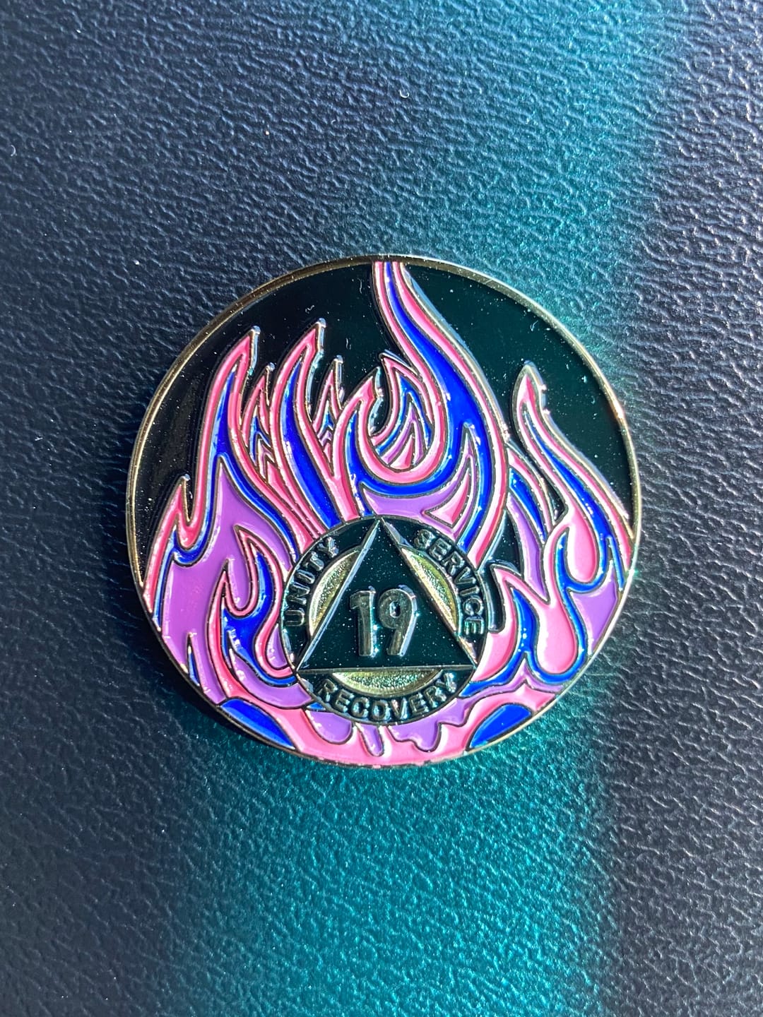 Customer photo review of 1 to 40 Year Sobriety Mint Twisted Flames Gold Plated AA Recovery Medallion/Chip/Coin - Black/Pink/Purple/Blue