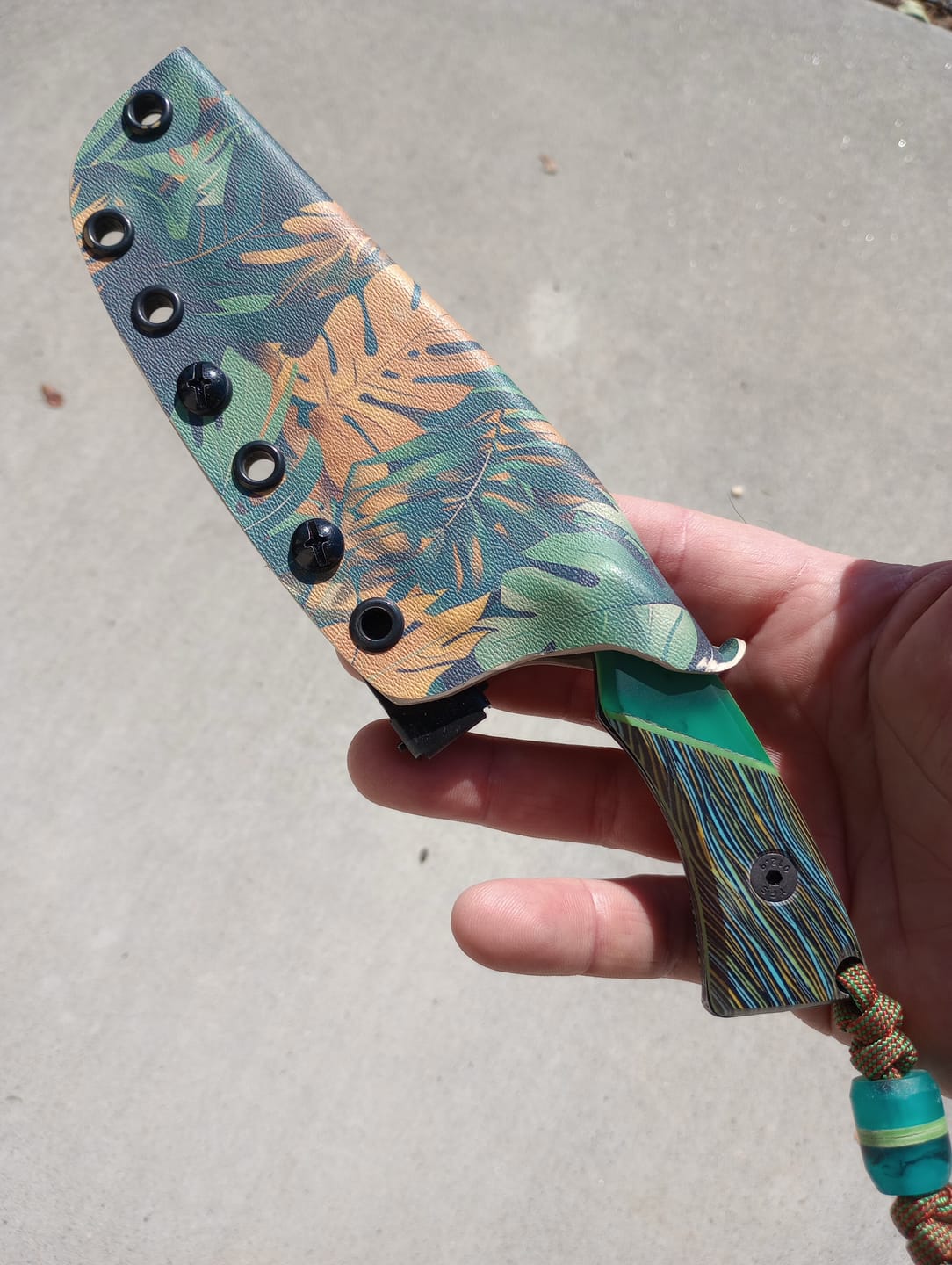 Customer photo review of Farmer Made EDC Big Boss 002 Fixed Blade - 4" 1095 Wharncliffe, Green Epoxy and Multicolor G10 - Made in USA (FM-BIGBOSS-002)