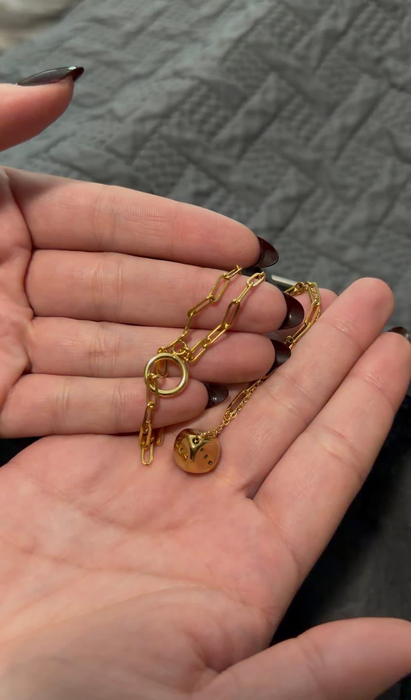 Customer photo review of Talis Dice Necklace