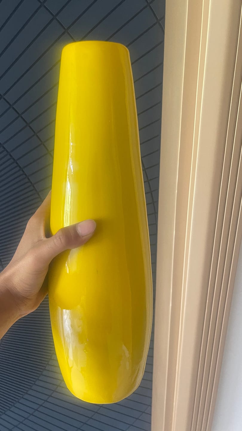 Customer photo review of Yellow Resin Vase Sculpture Vastu Remedy for Financial Stability, and Expenditure Control for SSW Direction Placement in Home, Office and Living Spaces | 8 x 37 cm | 600 gm