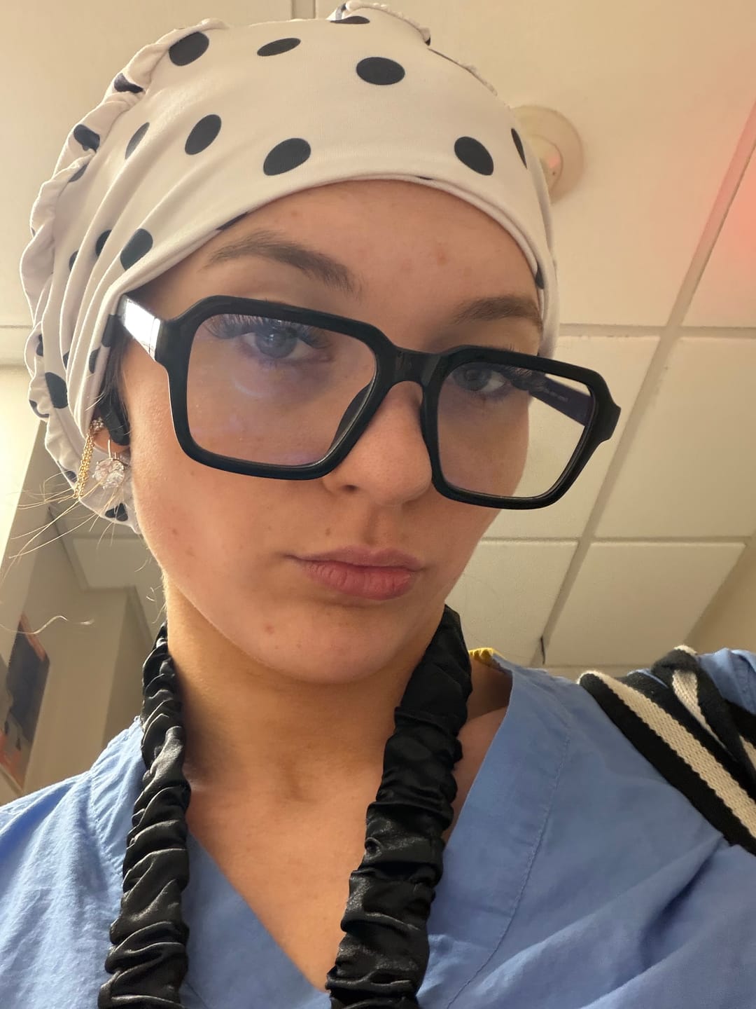 Customer photo review of CloudCaps Scrub Cap | Black Polka Dots