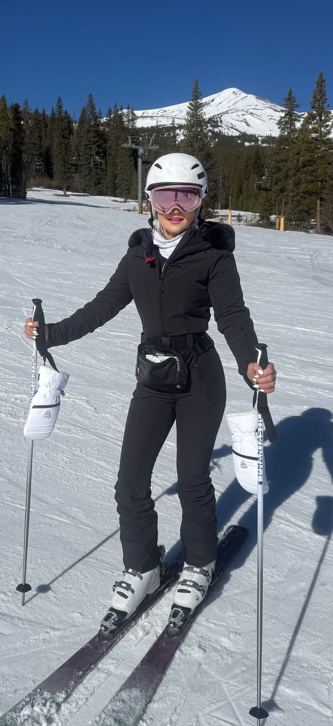 Customer photo review of Women's Minimalist Faux Fur Black & White Down One-piece Ski Suits