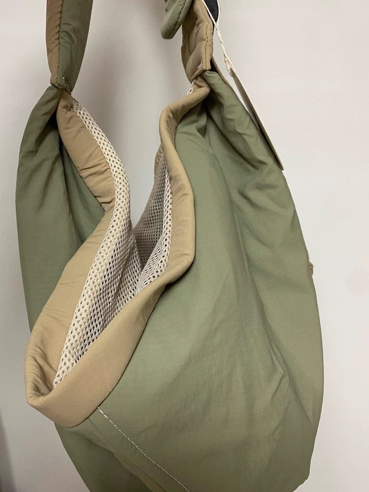Customer photo review of Wide-Strap Cradle-Style Structured Pet Sling Carrier Bag