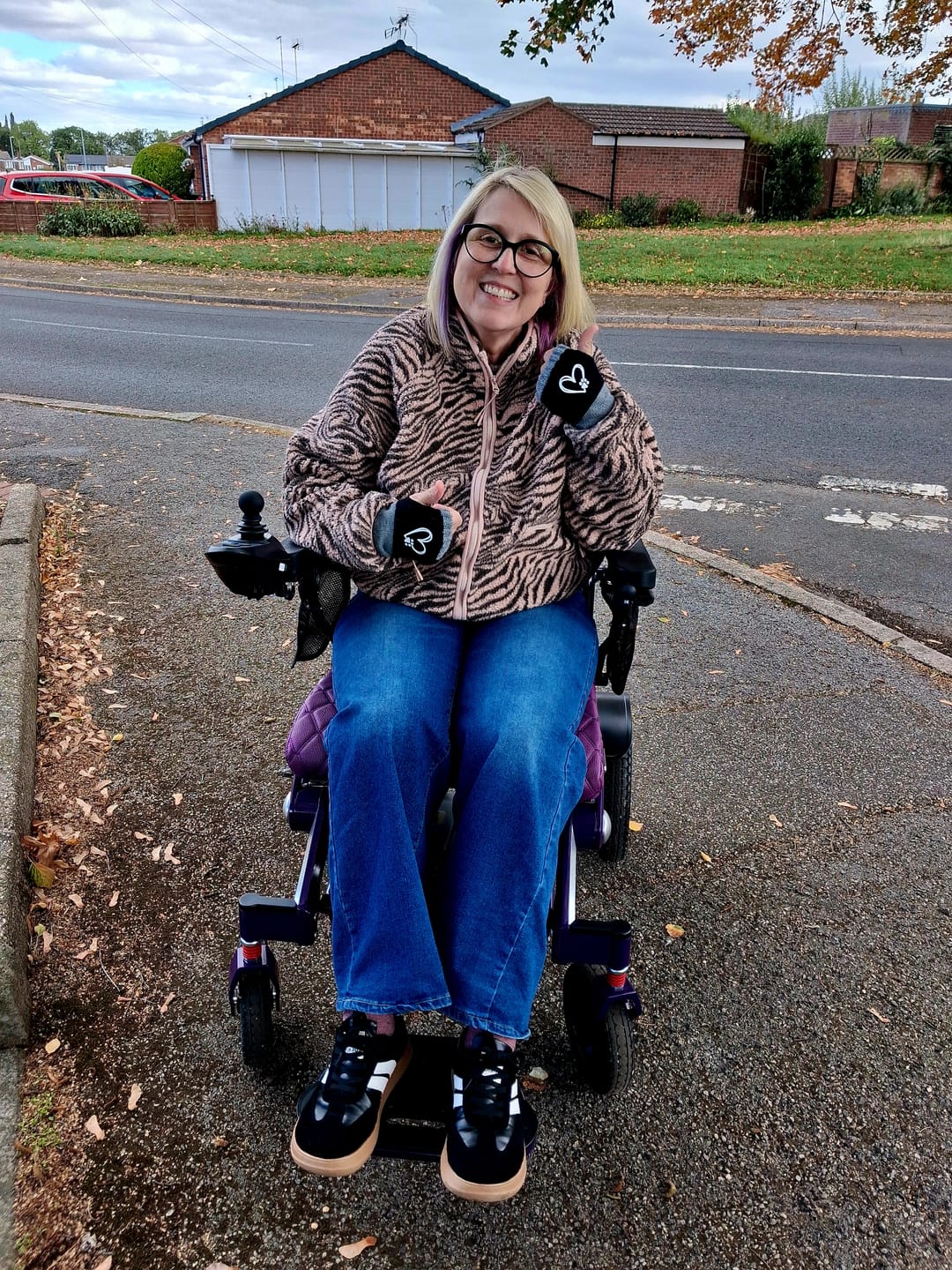 Customer photo review of Limited Edition Purple Lightweight Electric Wheelchair | Freedom Pro ST