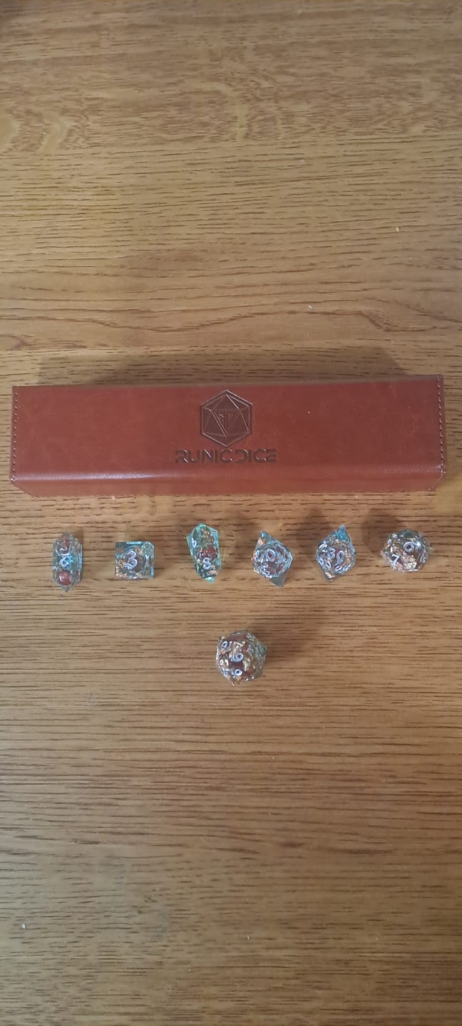 Customer photo review of Red And Gold Glitter Liquid Core Handmade Resin DND Dice Set