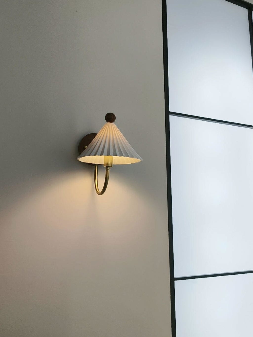 Customer photo review of Pleated Linen Wall Light, Curved Brass Arm, Ceramic Canopy