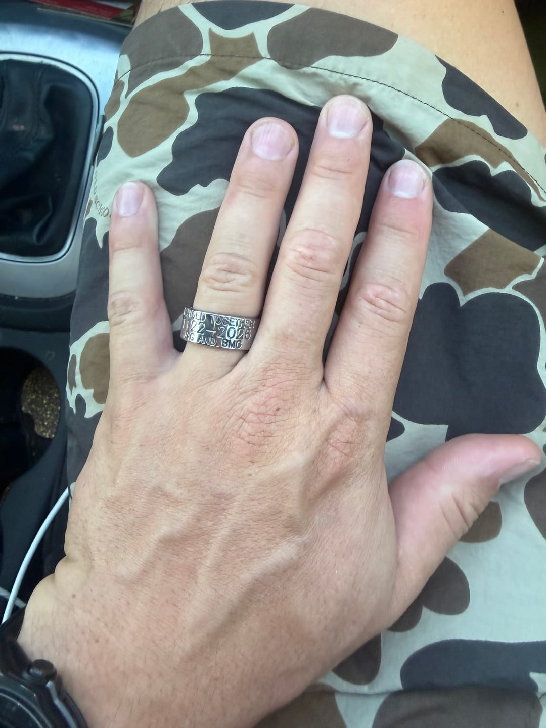 Customer photo review of Duck Band Wedding Ring - 10mm Titanium