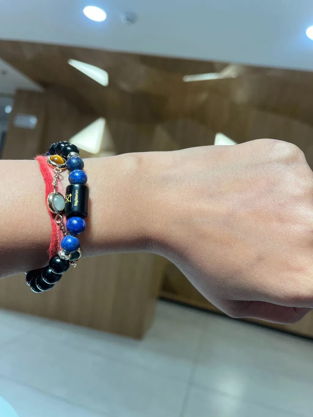 Customer photo review of Sagittarius (Dhanu Rashi) Zodiac Bracelet – Natural Black Obsidian & Lapis Lazuli