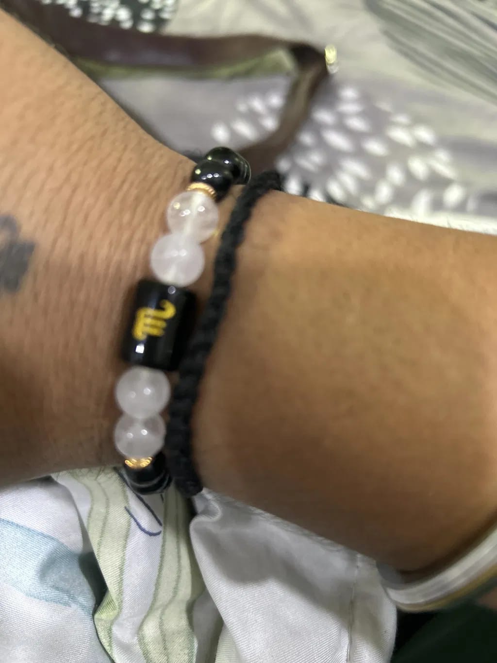 Customer photo review of Scorpio (Vrishchik Rashi) Zodiac Bracelet – Natural Black Obsidian & Milky Quartz