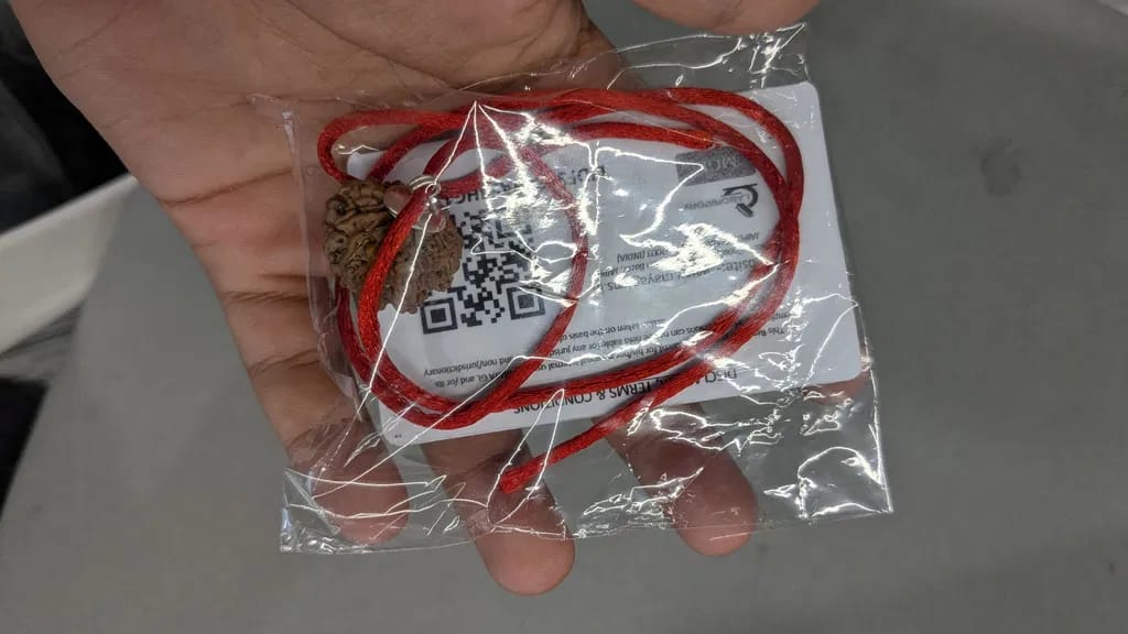Customer photo review of Nepal Origin 9 Mukhi Rudraksha – 100% Natural & Certified
