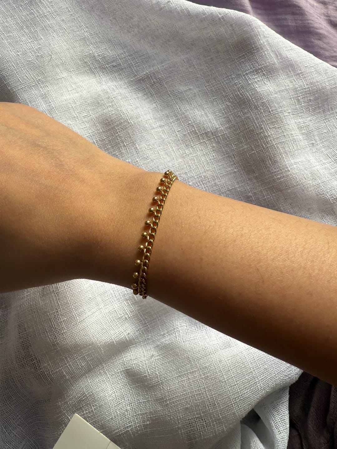 Customer photo review of Brie Cuban Chain Droplet Bracelet