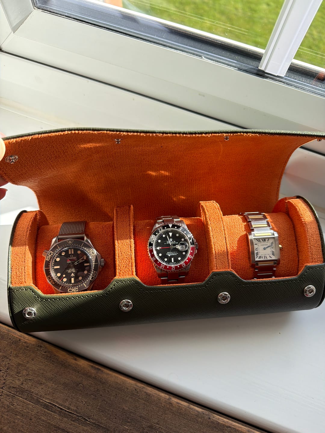 Customer photo review of Olive on Orange watch roll with sliding pillows - 3 watches
