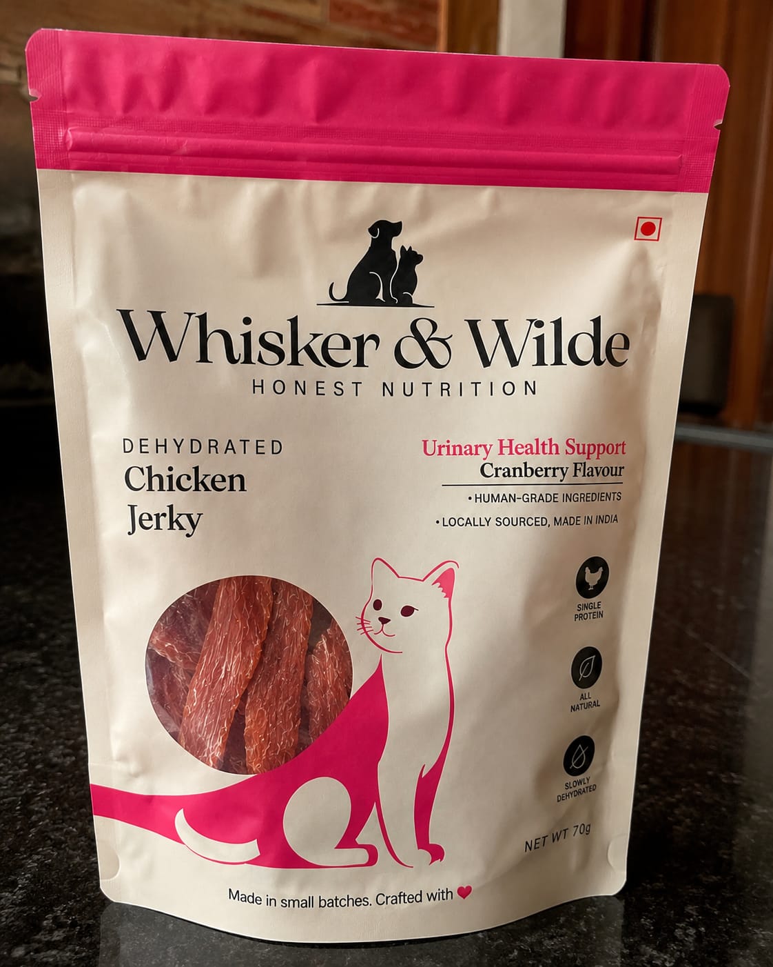 Customer photo review of Dehydrated Chicken Jerky – Cranberry (Cat)