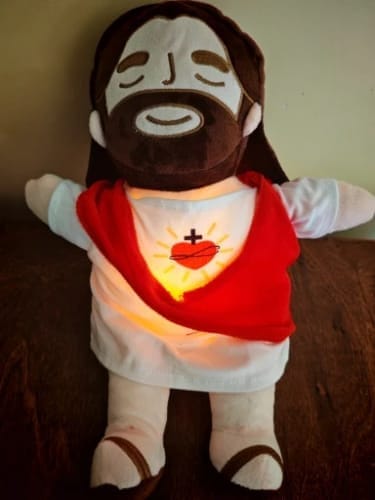 Customer photo review of Breathing Jesus Plush for Sleep Better