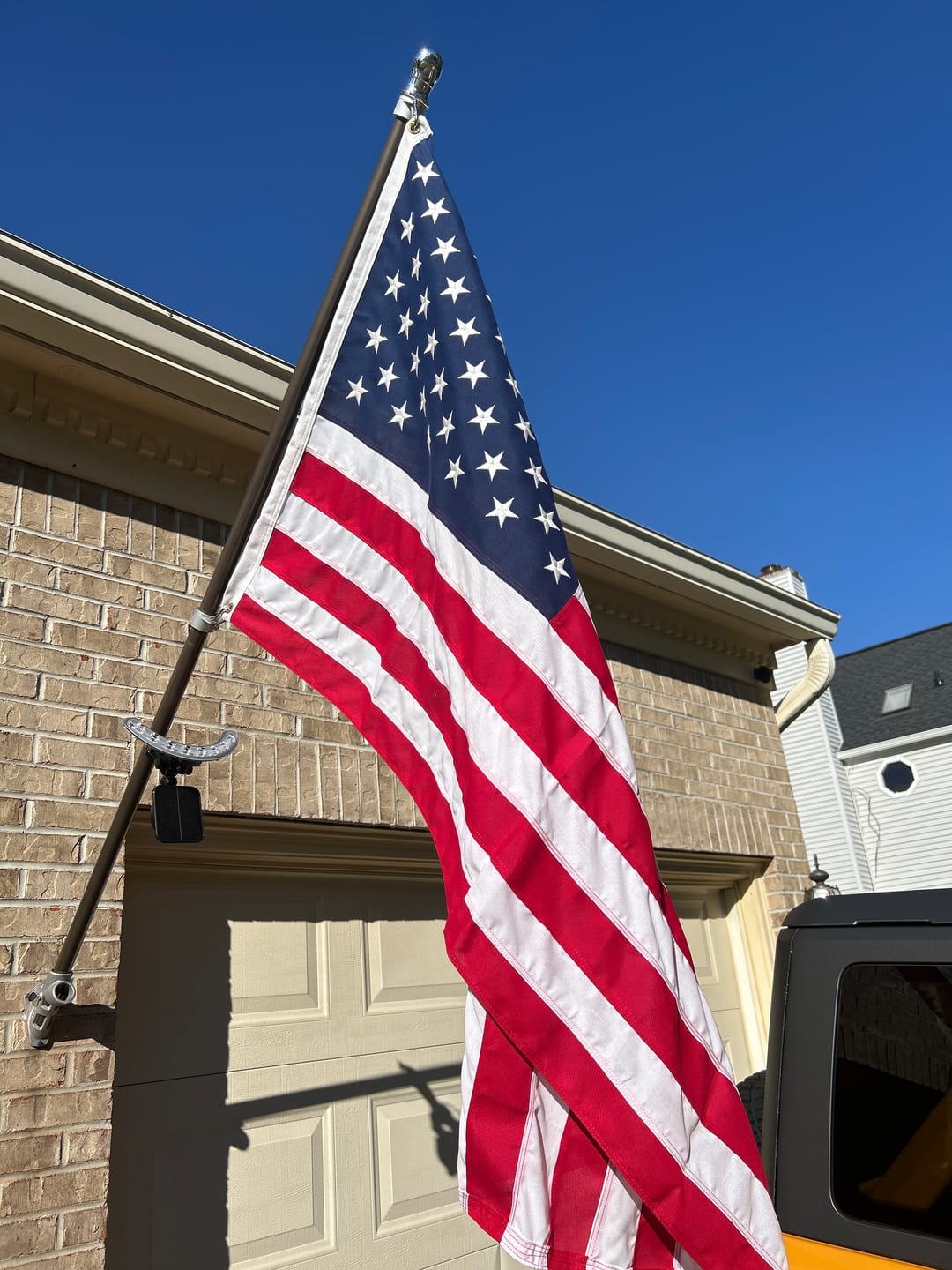 Customer photo review of NEW! Solar Flagpole Light for Wall-Mounted Flagpoles