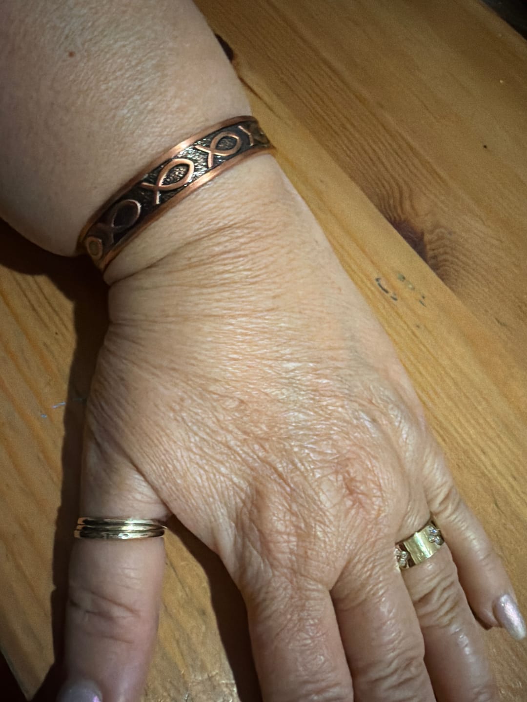 Customer photo review of Faith Ichthys Copper Cuff – Light-Revealed Edition for Her