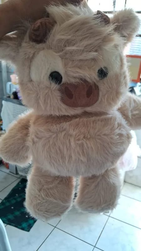 Customer photo review of MooDash BoopJoy – La vaquita de peluche que corre