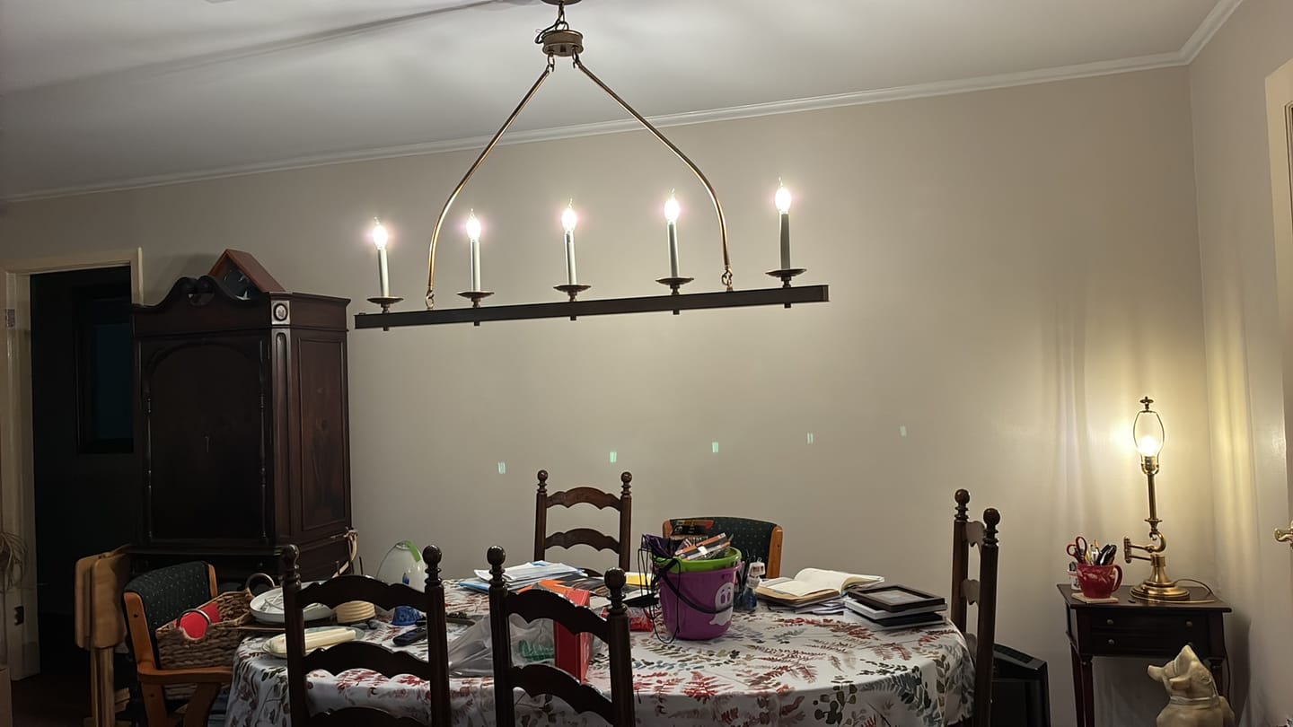Customer photo review of 5-Light French Distressed Gold Candle Linear Island Chandelier