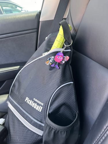 Customer photo review of Holding Pickleball Paddle Keychain - Personalized Pickleball Mascot Keychain Gift for Male & Female Pickleball Player